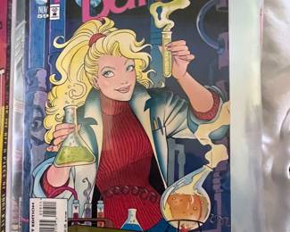 Assorted comic books in binder Vintage