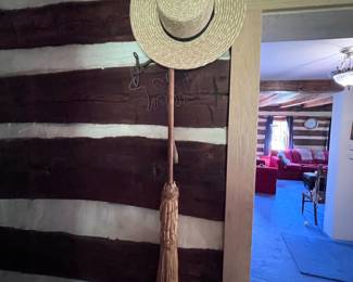 Old whisk broom and hat