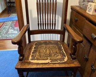Antique chair with leather seat