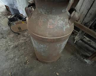 Antique milk can