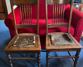 Antique oak chairs with leather seat bottoms