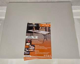 New unused folding table. $30
