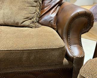 Upholstered/leather sofa 98"W with a 20" seat height $500