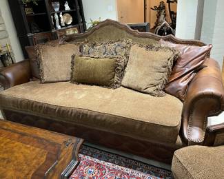 Upholstered/leather sofa 98"W with a 20" seat height $500