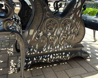 Wrought iron patio table and 8 chairs; includes cushions (see photos of cushions) $1750