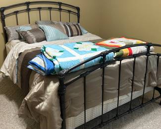 Full sized heavy iron bed. Great quality and sharp looking.