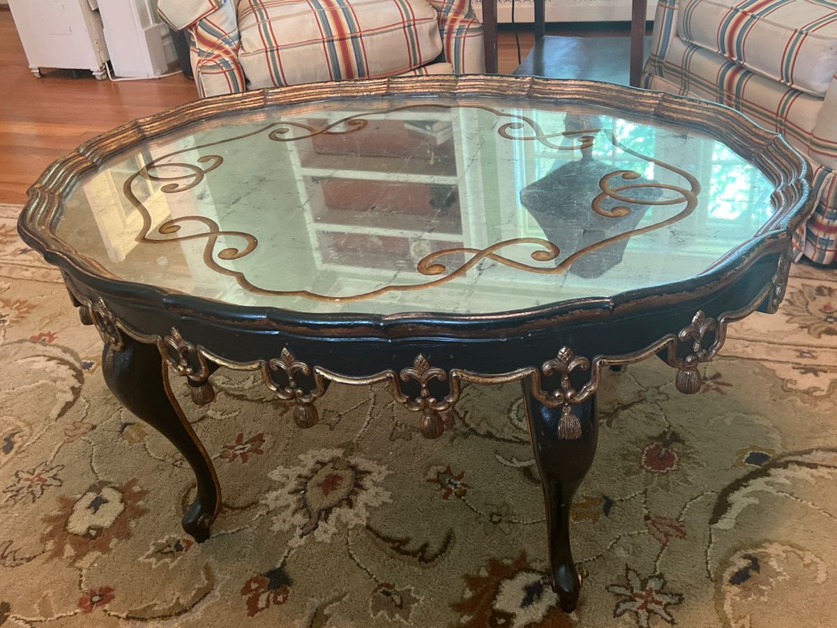 Stunning oval coffee table with mirrored top