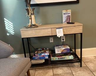 Console table with drawers. Games sold separately