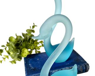Blue glass swans