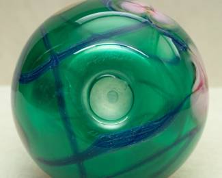 Closeup of an early Charles Lotton art glass vase, green glass with a combination of his Multi Flora and Hearts and Vines decoration; signed and dated 1979.