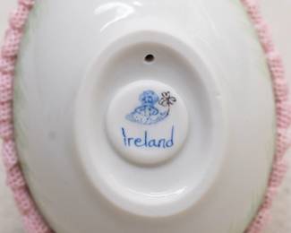 An Irish Dresden porcelain rabbit family figurine, and am Irish Dresden hand painted porcelain egg shaped trinket dish with rabbit on top