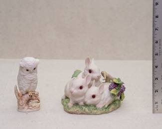 A vintage Cybis porcelain baby white owl on a branch figurine, and Cybis porcelain three rabbits and grapevine figurine