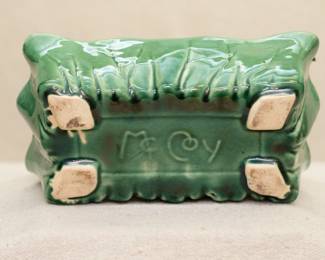 Base of the vintage green glaze McCoy #610 rectangular planter