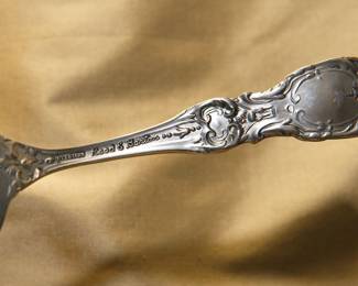 Closeup of the sterling silver tableware by Reed & Barton in the 'Francis I' pattern