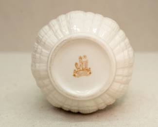 Base of the Belleek Ireland porcelain vase, ribbed, sawtooth pattern surface and applied floral spray