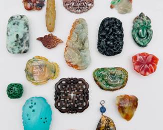 Reverse view of the carved Chinese jade and other hard stone pieces