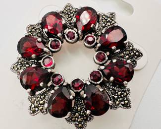 Vintage sterling silver, garnet, and marcasite brooch