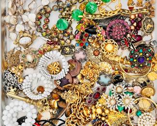 Just some of the costume jewelry we have for you at this estate sale! Vintage earrings, bracelets, necklaces, brooches, pins, sets of jewelry from Hattie Carnegie, Crown Trifari, Miriam Haskell, Napier, Coro, Monet, and tons more...