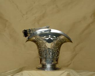 Another view of very large antique sterling silver pierced basket with swing handle; Birmingham, England makers mark
