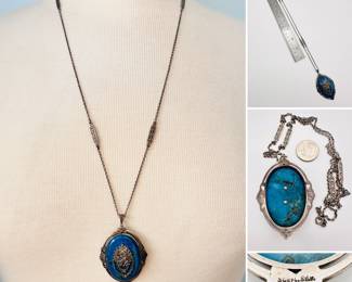 Delicate sterling silver link necklace with blue stone pendant decorated with a silver filigree and marcasite flower basket. Marked to the back with "Sterl. Silv." and artisan's stamp.