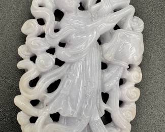A Chinese jadeite carving of a figure in flowing robes amidst clouds, likely representing a Taoist immortal