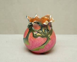 A Charles Lotton Lava Cypriot art glass vase. Signed and dated "1988". Iridescent green gather over pink marbled textured ground. Pinched rim.