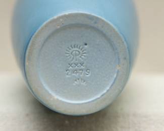 View of the base of the Rookwood art pottery vase #2479 with flower band below the rim, matte blue glaze, dated 1930
