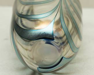 Another view of the beautiful handblown art glass vase by John Lotton, clear glass with iridescent pulled waves of color and a flared waved rim. Signed and dated 1989.