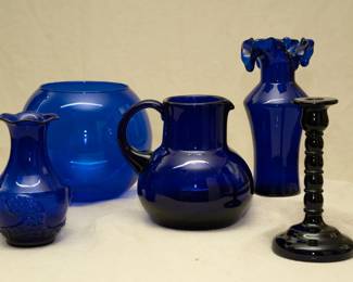 Vintage cobalt blue glass vases, pitchers, and candlestick