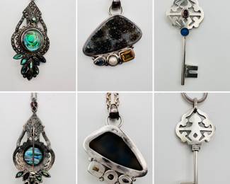 A sterling silver pendant necklace with peacock pattern abalone shell and marcasite, an artisan sterling silver natural stone, topaz and pearl pendant, and a charming sterling silver key pendant accented with cabochon stones.
