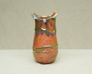 A Charles Lotton Lava Cypriot art glass vase. Signed and dated 1992. Cased glass, iridescent greenish gold gather over an orange textured ground. Pinched rim.