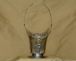 Another view of very large antique sterling silver pierced basket with swing handle; Birmingham, England makers mark