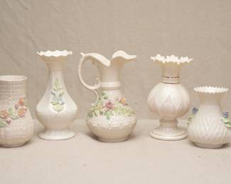 Porcelain from Belleek Pottery (Ireland) including Belleek Ireland porcelain vase, ribbed, sawtooth pattern surface and applied floral spray; a Belleek Ireland tower vase with applied Forget-Me-Not blossoms, a Belleek Ireland porcelain 'Aberdeen' ewer vase with applied sprays of roses and forget-me-nots, a Belleek Ireland Lotus Spill Vase, a vintage Belleek Ireland Thistle Top Vase