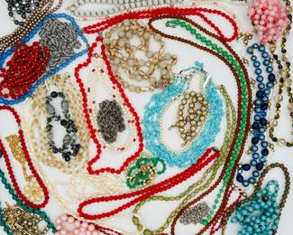 Hundreds of gorgeous antique beaded necklaces in glass, stone, crystal, porcelain, lucite, wood, enamel, faux pearls and more! Every color and length that you're looking for.