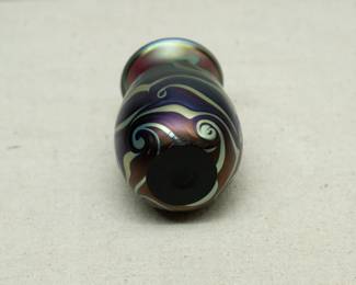 Another view of the original blown art glass vase, deep blue with green and gold swirls; signed and dated John Lotton 1989.