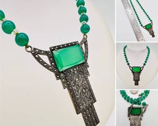 A show-stopping Art Deco era sterling silver, green stone and marcasite pendant necklace