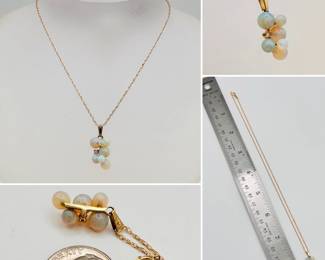 14k yellow gold pendant with a cluster of opal beads and a small set diamond