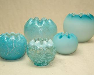 Art glass rose bowls including a Fenton Glass blue opalescent Daisy and Fern rose bowl, and two Fenton blue case satin glass rose bowls