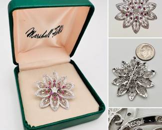 14k white gold brooch, a 10-petal flower shape set with rubies and diamonds