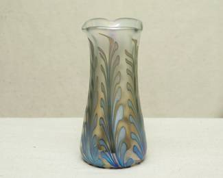 An elegant art glass vase by Charles Lotton, applied colors pulled into feather forms, base with engraved signature and '1991'