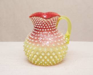 A 19th century Hobbs, Brockunier & Company dew drop or hobnail opalescent Rubina Verde uranium glass pitcher with applied clear vaseline glass handle