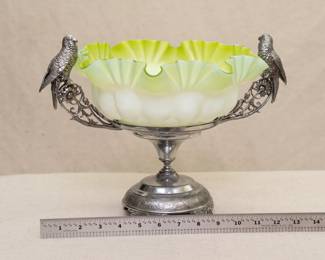 True Gilded Age glamor with this antique cased art glass bride's basket held in an ornate silver plated stand with perched parrots, the stand made by E. G. Webster Bro N.Y., both pieces circa 1870s–1880s.