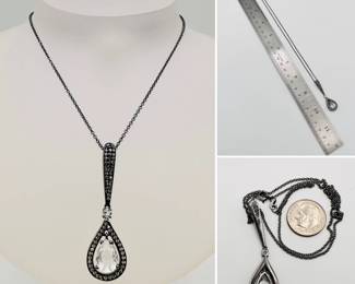 A great Art Deco vintage sterling silver necklace, a delicate chain with a sterling and clear crystal teardrop shaped pendant. Pendent marked .925 'AU' and the chain has a .925 stamped near the clasp.