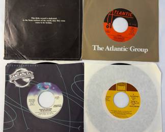 Single 45 records by the Pointer Sisters, Laura Brannigan, Stevie Wonder