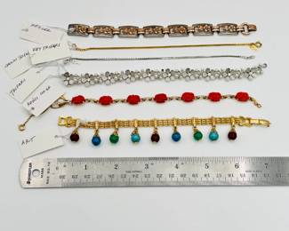A selection of delicate bracelets from Krisler, Key Trifari, Crown Trifari, Rongi, and Art
