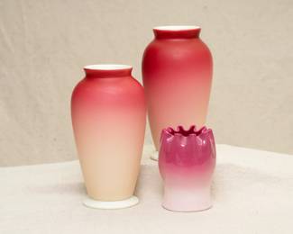 Two satin finish Burmese art glass vases and a small peachblow art glass vase, the latter likely by New England Glass, their "“Wild Rose" line.