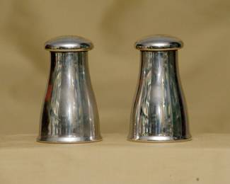 A closer view of the two Peugeot silver plated salt shakers