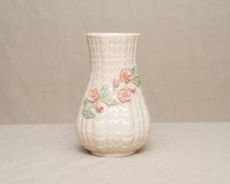 Belleek Ireland porcelain vase, ribbed, sawtooth pattern surface and applied floral spray