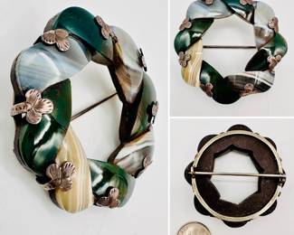 A marvelous antique Scottish agate and bloodstone circular brooch in sterling silver, the stones in curved segments that appear overlapping. Unmarked.