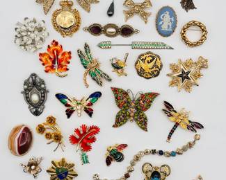 Costume jewelry brooches and more brooches – enamel, rhinestone, gold, silver, and pewter tones, we got it all!
